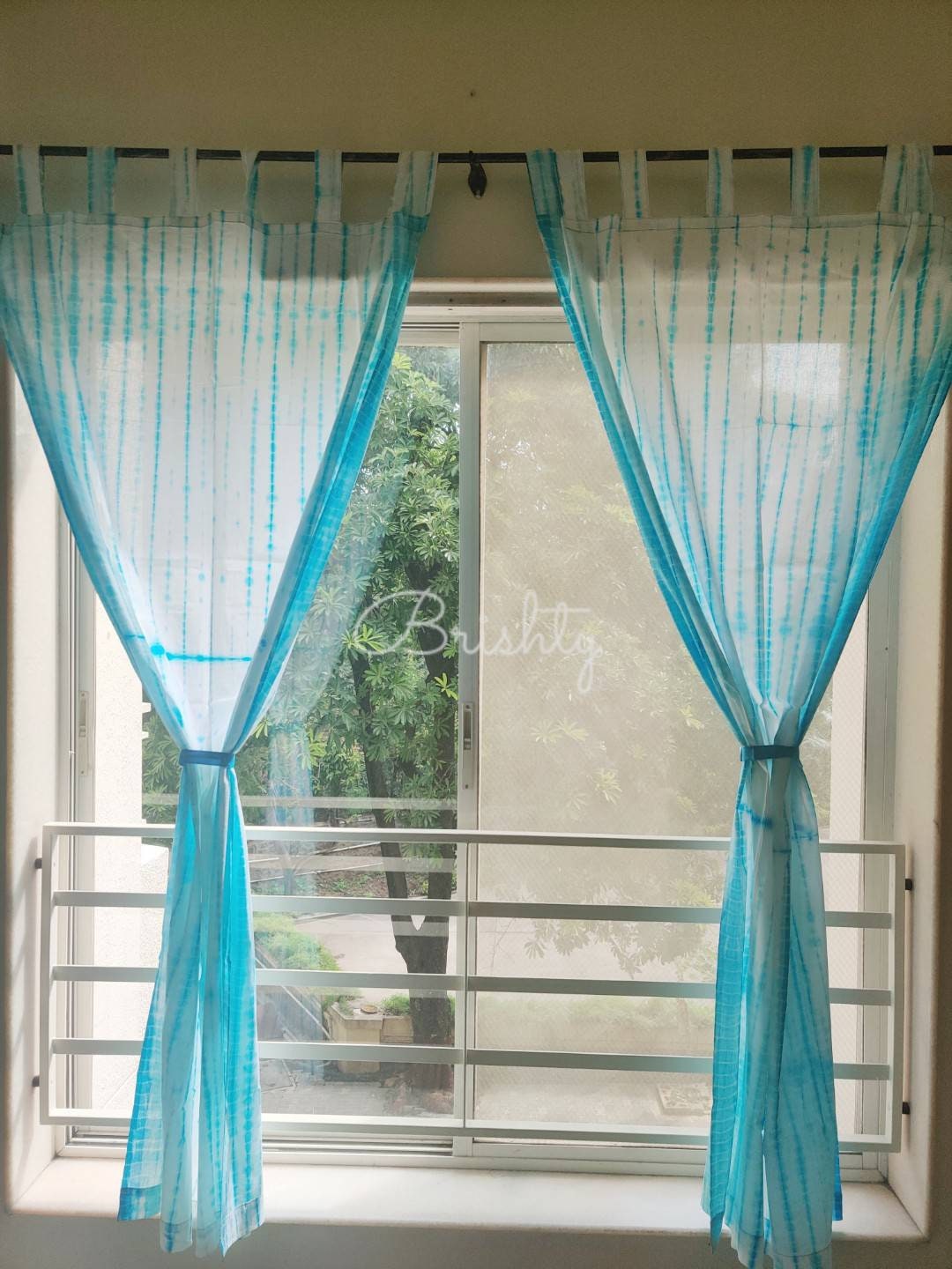 Turquoise tie dyed sheer coastal curtains