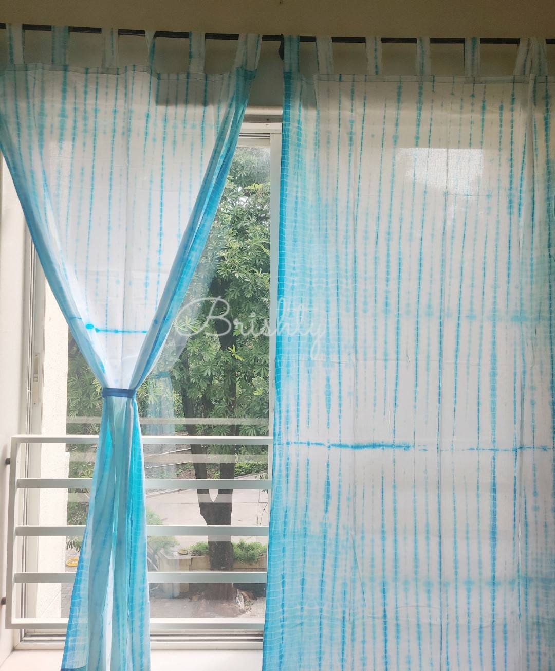 Turquoise tie dyed sheer coastal curtains