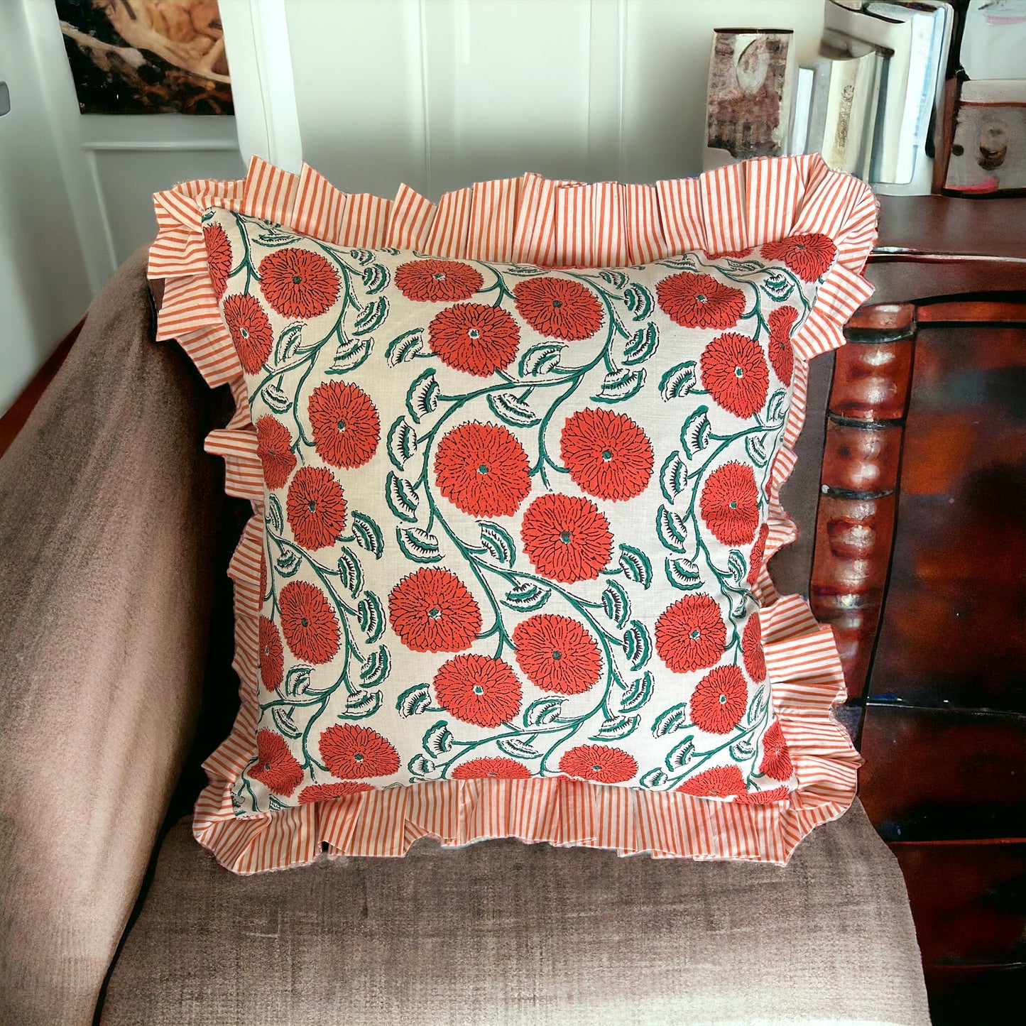 Orange floral ruffled cushion cover