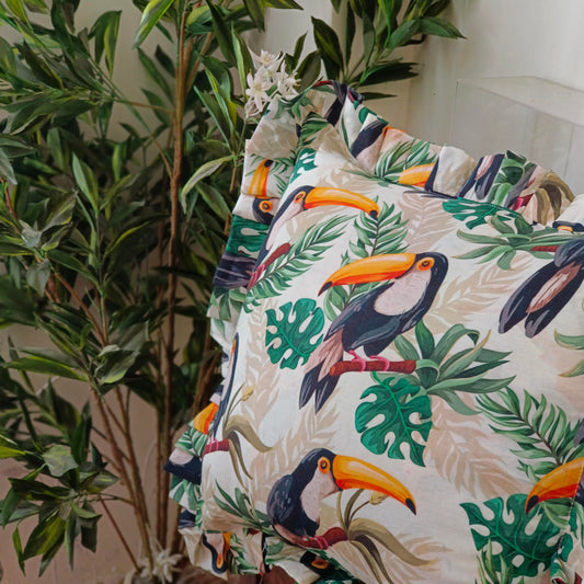 Toucan in the rainforest cushion cover