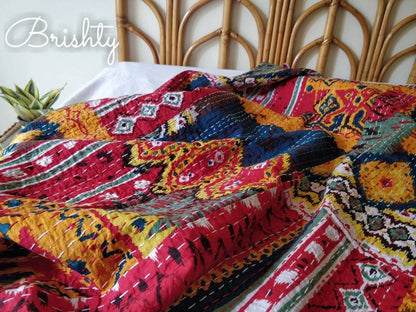 Colorful red kantha bedcover