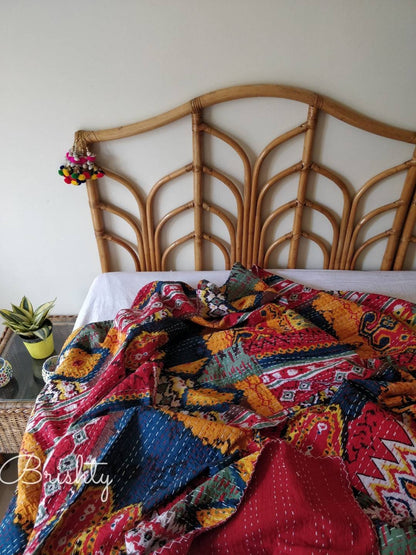 Colorful red kantha bedcover