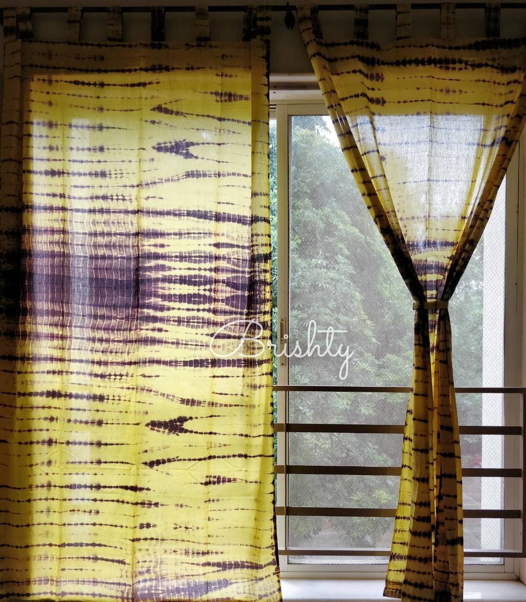 Yellow and brown tie dyed sheer curtains