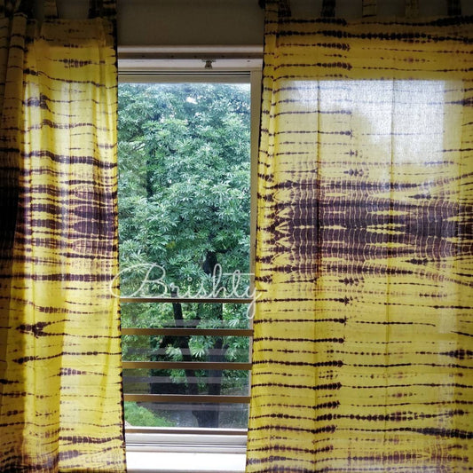 Yellow and brown tie dyed sheer curtains