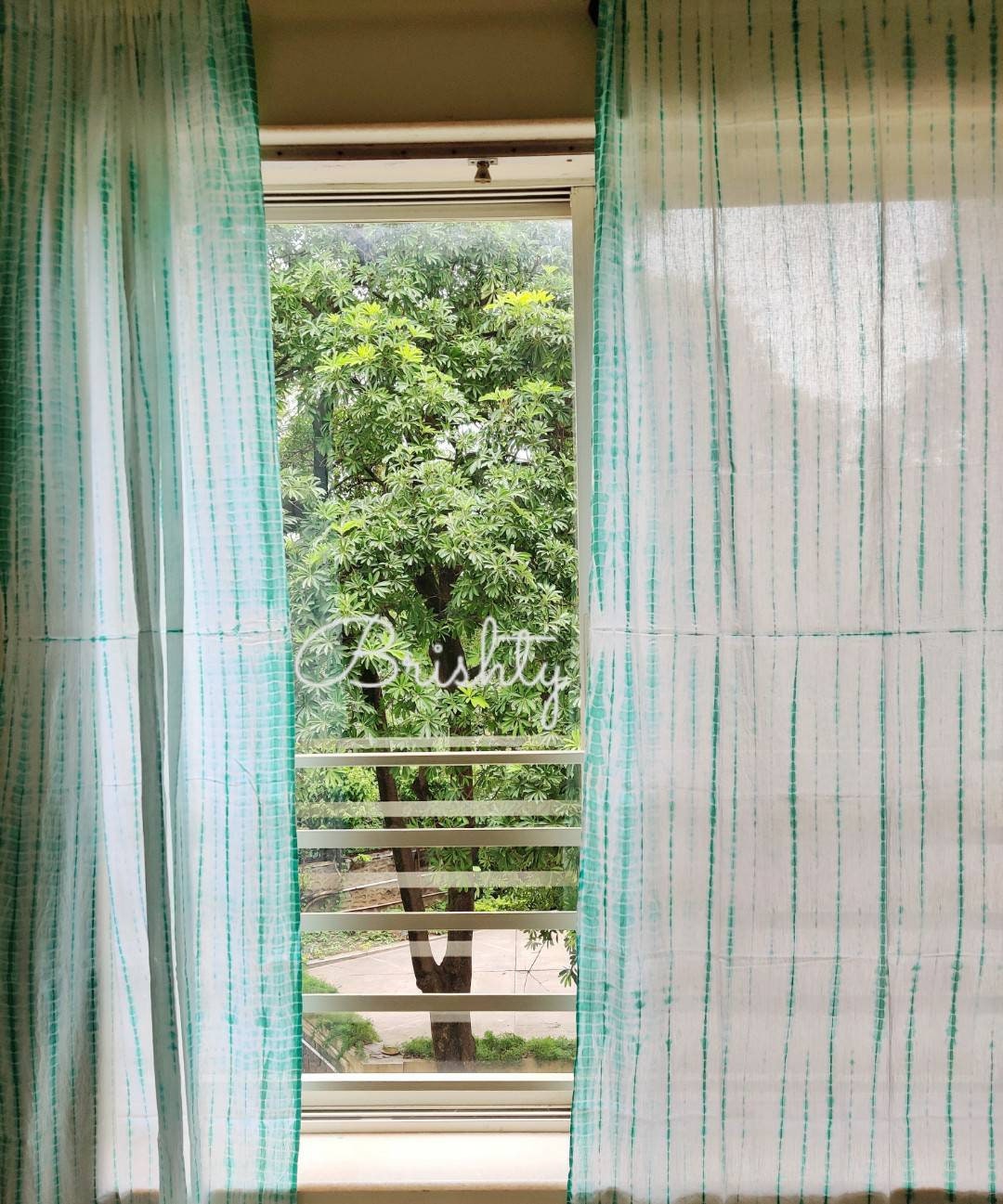 Sea green tie dyed sheer curtain