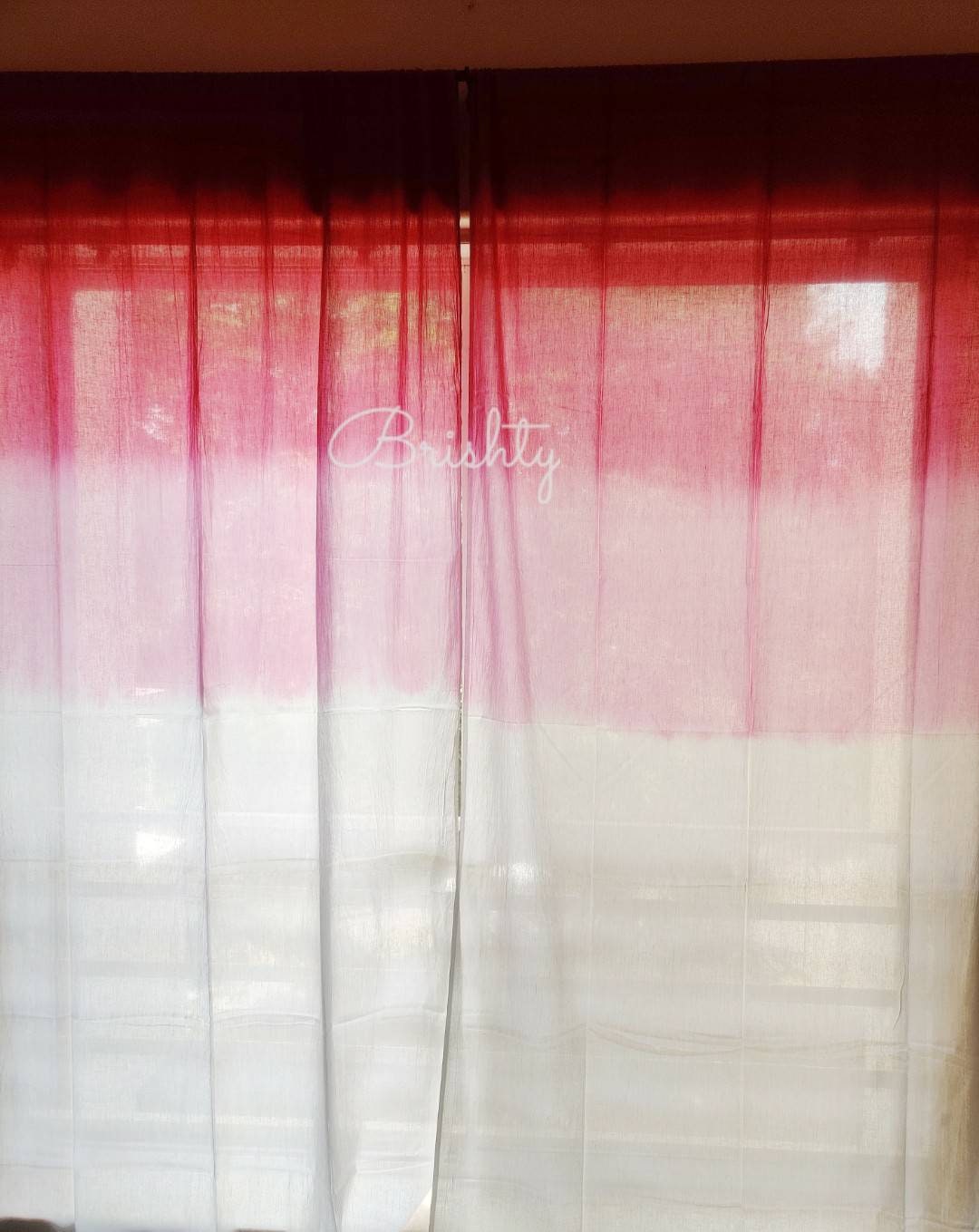 Pink and white ombre sheer curtain panels,